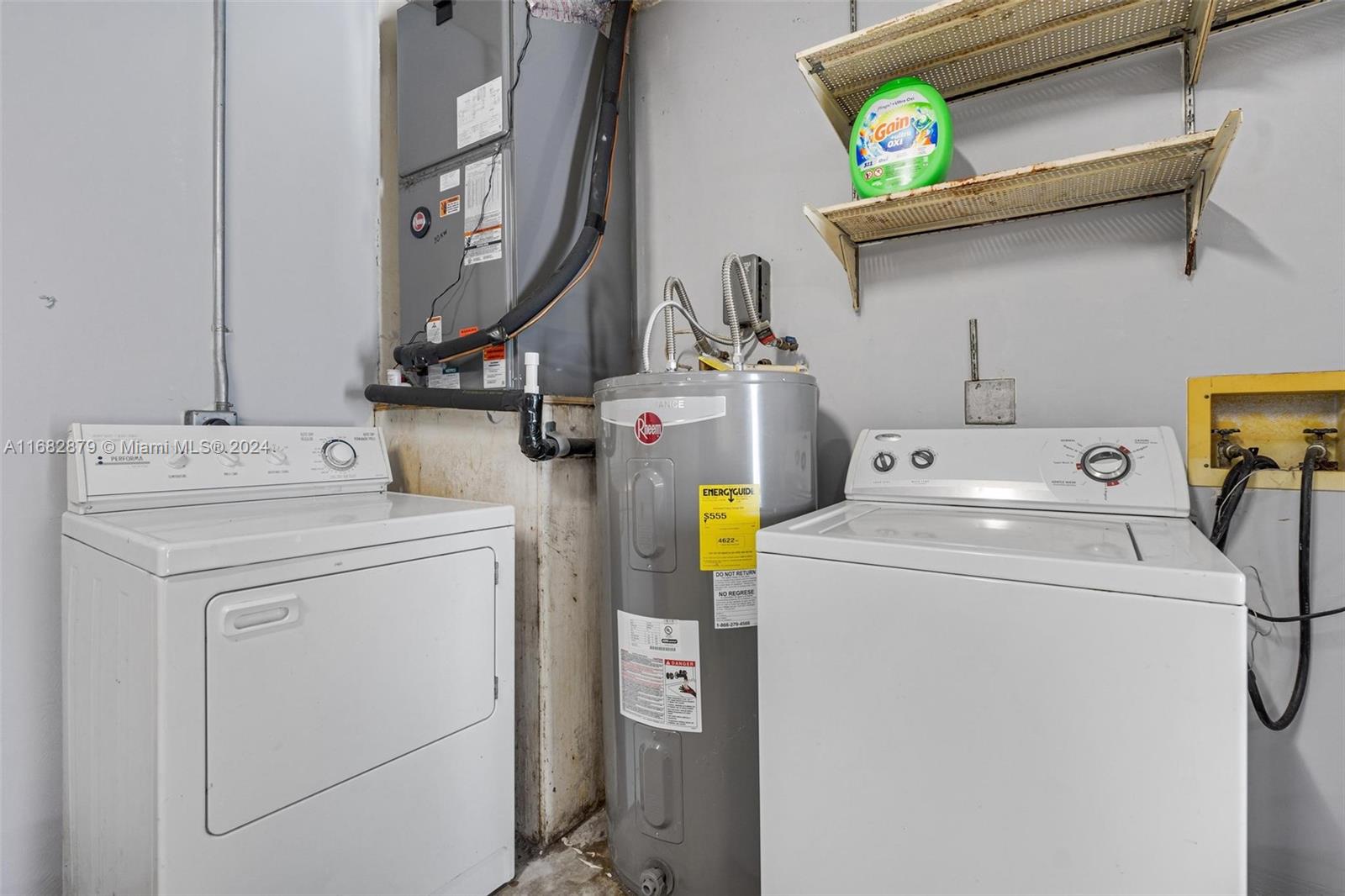 14006 Southwest 48th Terrace Miami, FL 33175 - Photo 24 of 24 a utility room with dryer and washer