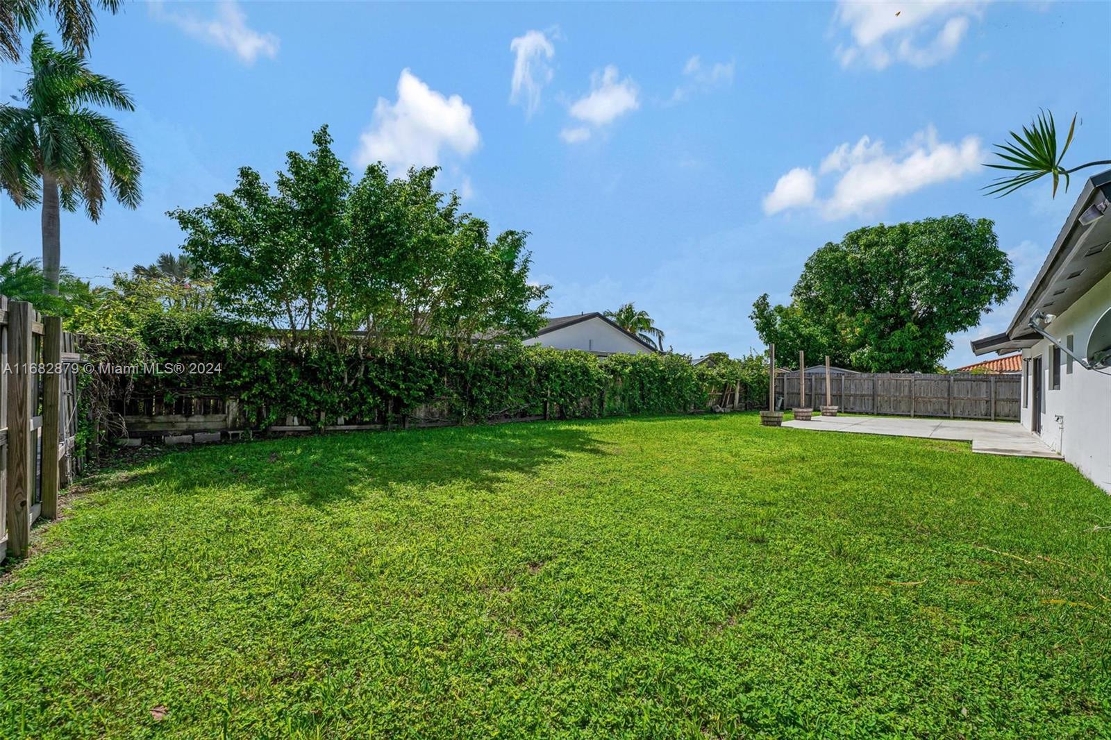 14006 Southwest 48th Terrace Miami, FL 33175 - Photo 3 of 24 a view of yard with green space