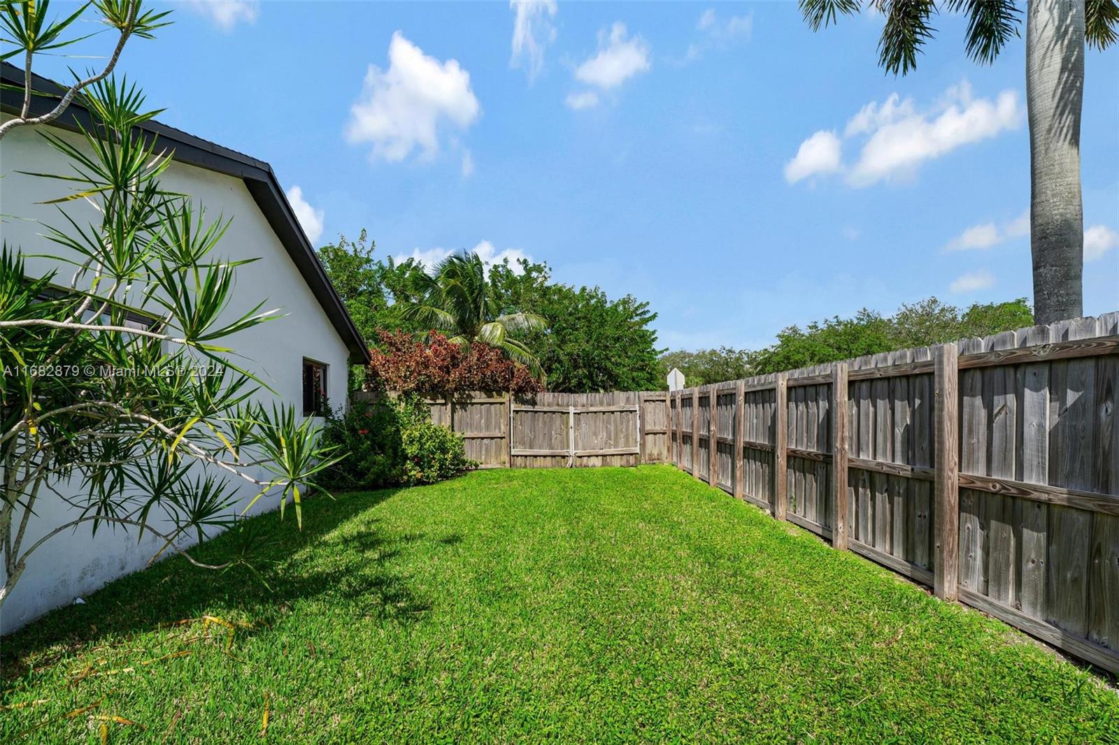 14006 Southwest 48th Terrace Miami, FL 33175 - Photo 4 of 24 a view of backyard with green space