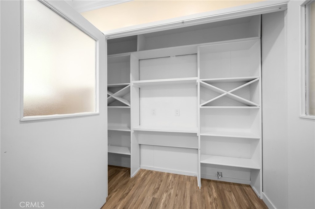 575 Winona Way Pasadena, CA 91103 - Photo 12 of 29 a view of walk in closet with empty racks