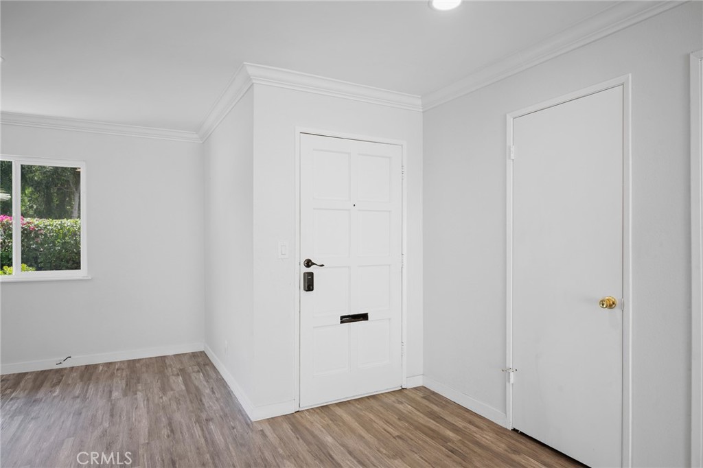 575 Winona Way Pasadena, CA 91103 - Photo 3 of 29 a view of a room with wooden floor and closet
