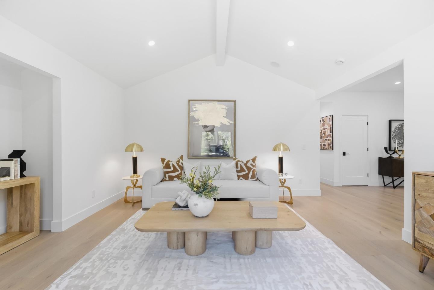 845 Pollard Road Los Gatos, CA 95032 - Photo 22 of 47 a living room with furniture a table and wooden floor