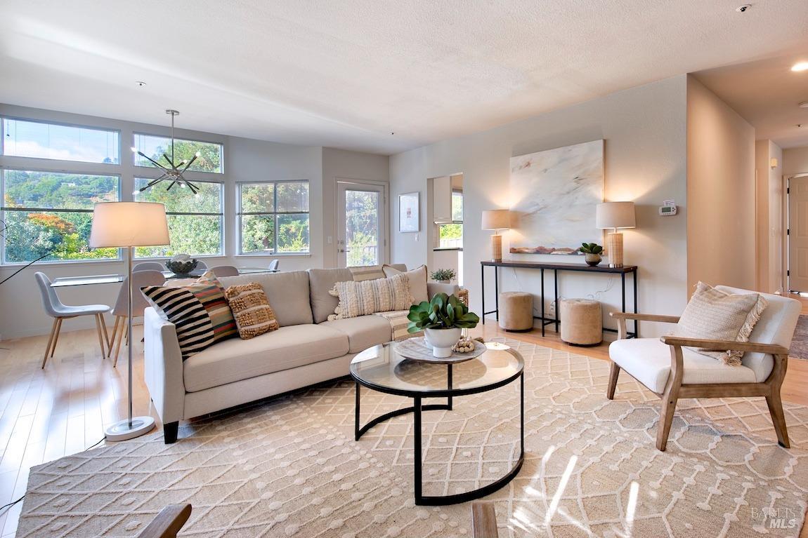 101 Parkview Circle Corte Madera, CA 94925 - Photo 1 of 1 a living room with furniture and a large window