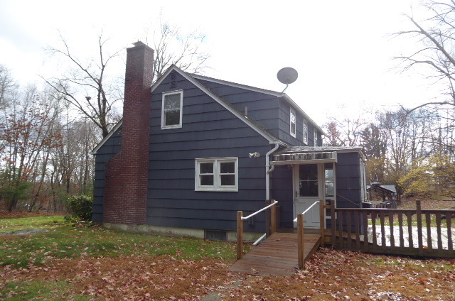 21 Schroback Road Plymouth, CT 06782 - Photo 2 of 22 a view of a house with backyard and trees