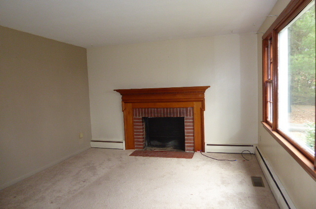 21 Schroback Road Plymouth, CT 06782 - Photo 8 of 22 a view of empty room with a fireplace