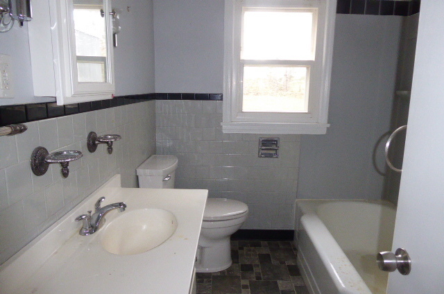 21 Schroback Road Plymouth, CT 06782 - Photo 9 of 22 a bathroom with a sink a toilet and a bathtub