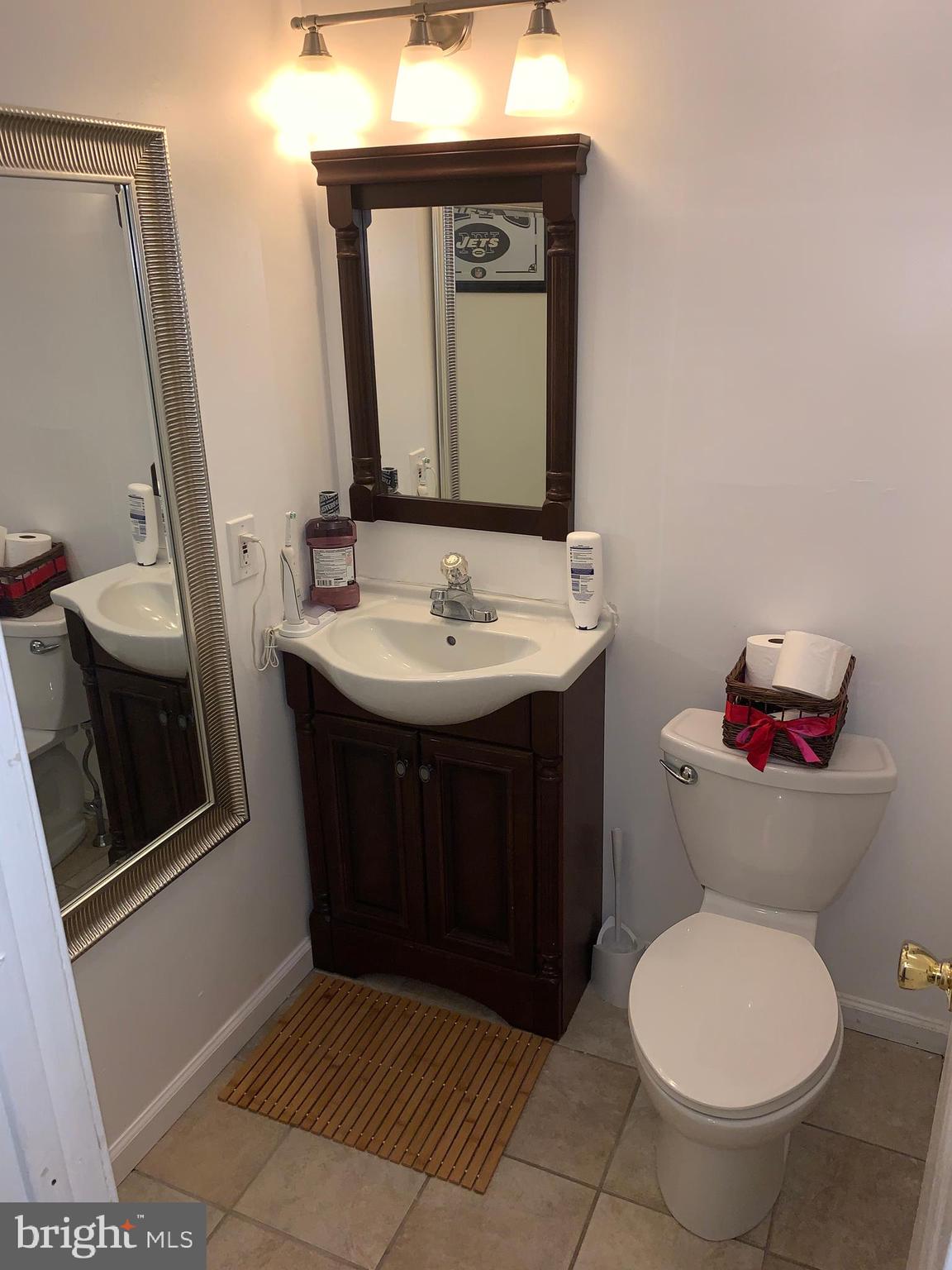1609 Huntingdon Mews Clementon, NJ 08021 - Photo 13 of 15 a bathroom with a toilet sink and mirror