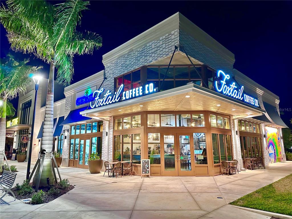 Cleo St Port North Port, FL 34286 - Photo 9 of 10 a view of large building with a palm tree