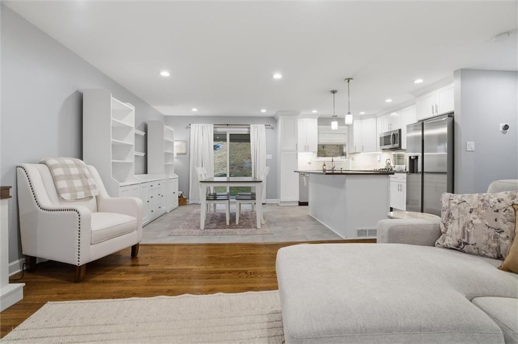 103 Tree View Drive Coraopolis, PA 15108 - Photo 11 of 48 a living room with furniture and a view of kitchen