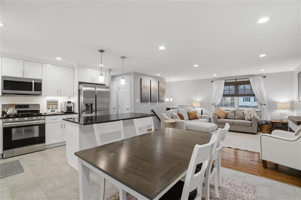 103 Tree View Drive Coraopolis, PA 15108 - Photo 13 of 48 a large kitchen with a table and chairs