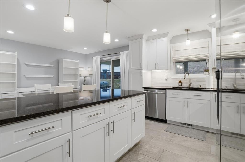 103 Tree View Drive Coraopolis, PA 15108 - Photo 18 of 48 a kitchen with white cabinets and sink