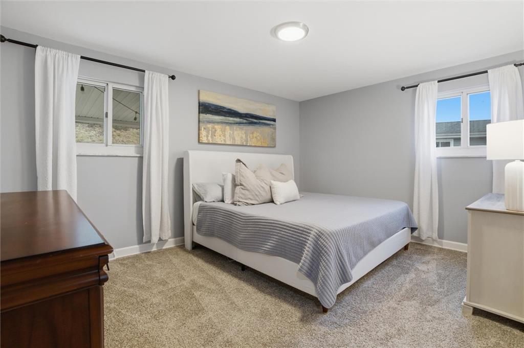 103 Tree View Drive Coraopolis, PA 15108 - Photo 23 of 48 a bedroom with a bed and a window