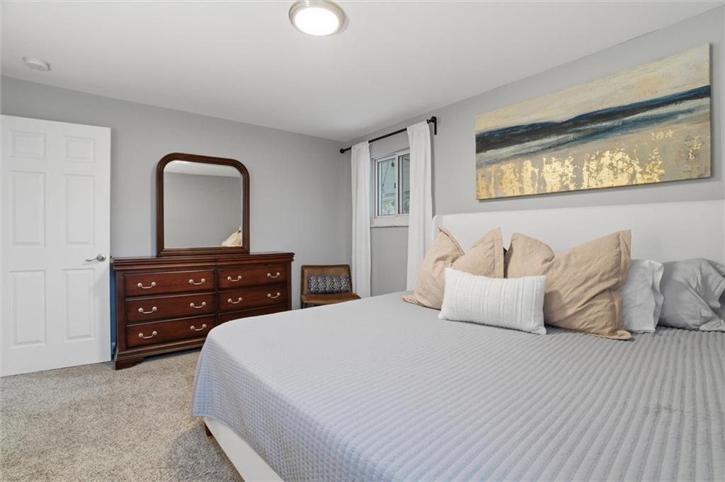 103 Tree View Drive Coraopolis, PA 15108 - Photo 24 of 48 a bedroom with a bed and a dresser