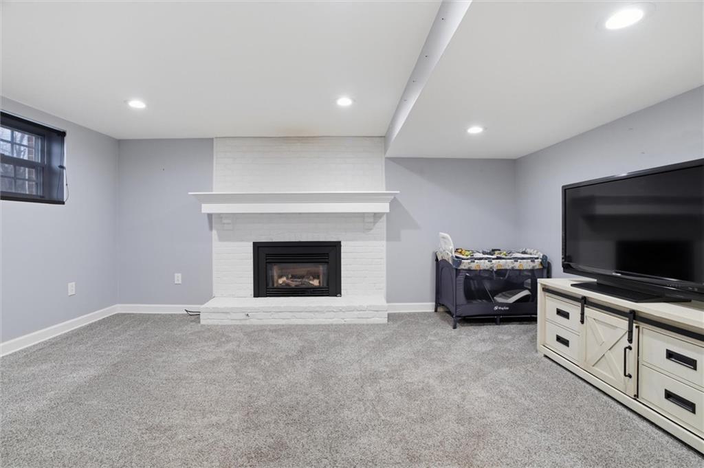 103 Tree View Drive Coraopolis, PA 15108 - Photo 34 of 48 a living room with furniture and a fireplace