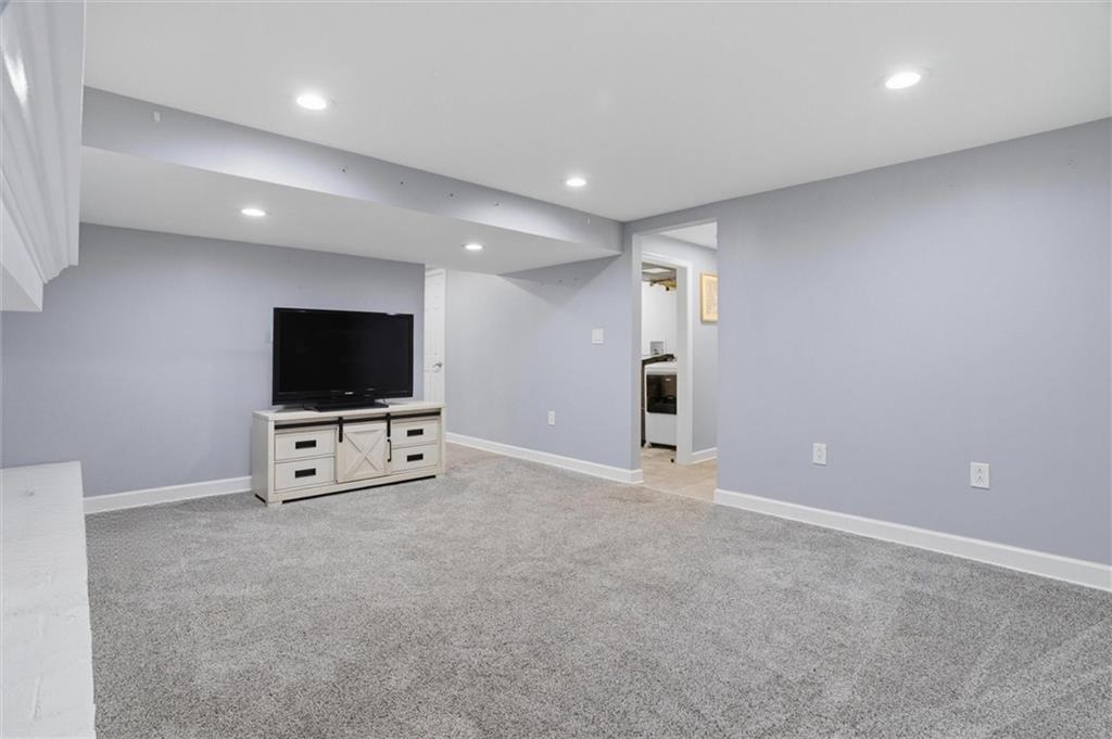 103 Tree View Drive Coraopolis, PA 15108 - Photo 37 of 48 wooden floor and flat screen tv