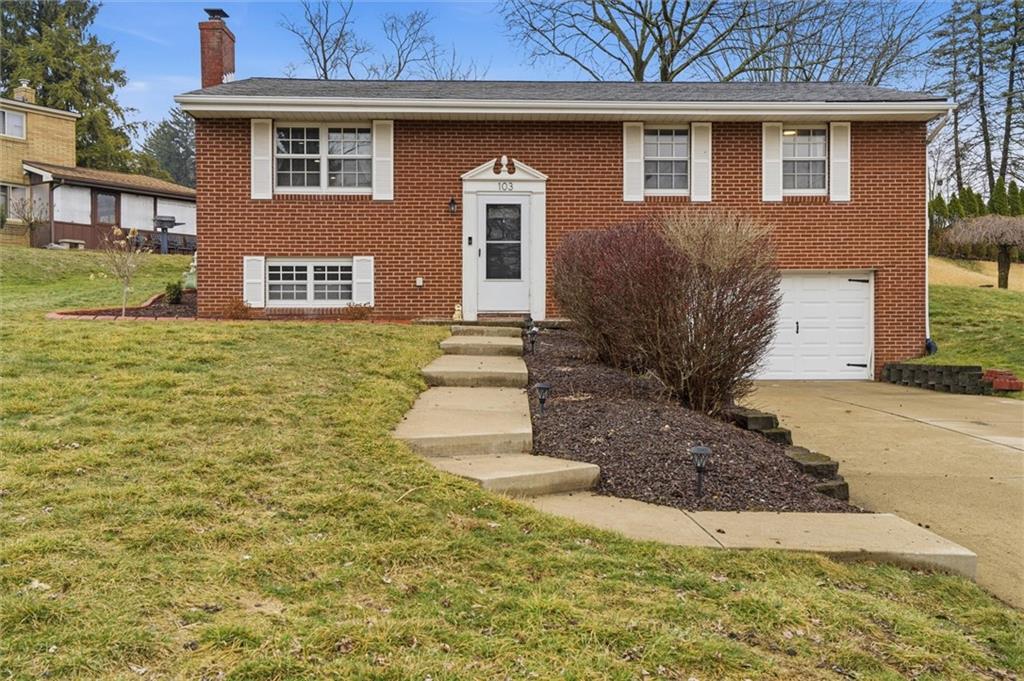 103 Tree View Drive Coraopolis, PA 15108 - Photo 4 of 48 a front view of a house with garden