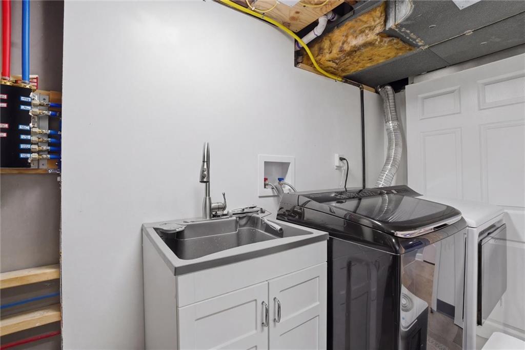 103 Tree View Drive Coraopolis, PA 15108 - Photo 42 of 48 a kitchen with stainless steel appliances granite countertop a sink and cabinets