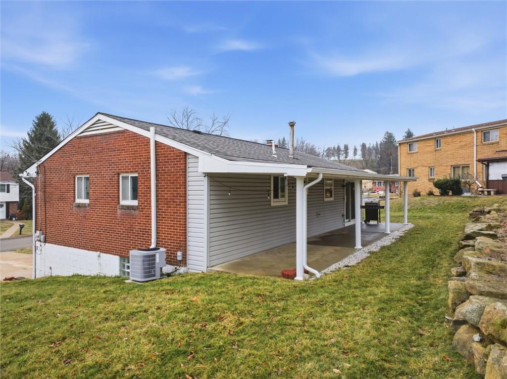 103 Tree View Drive Coraopolis, PA 15108 - Photo 46 of 48 a front view of a house with a yard