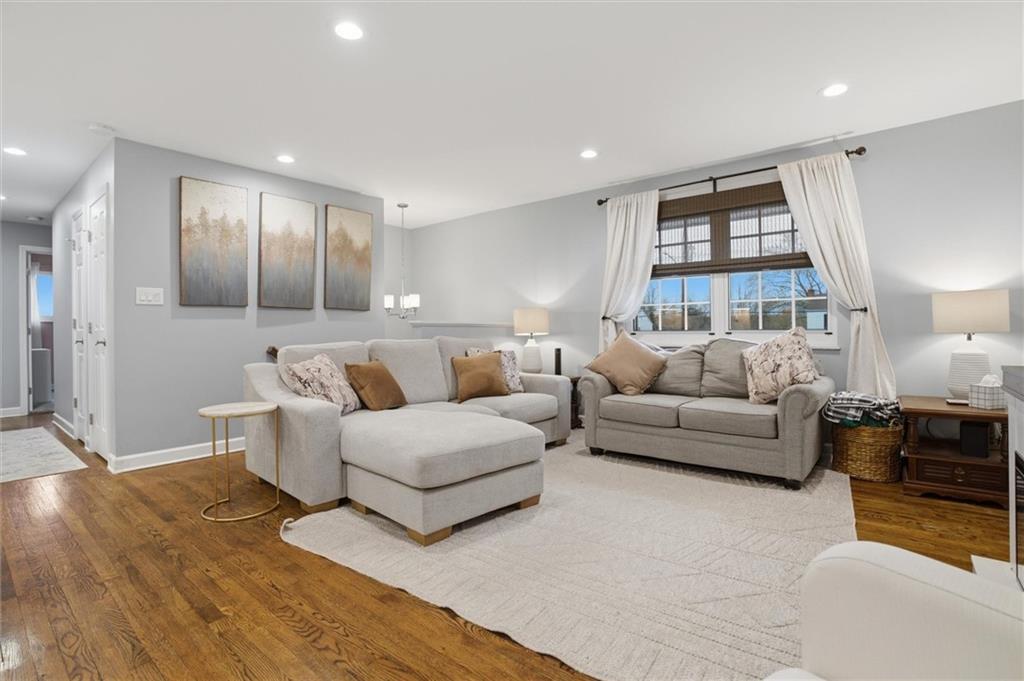 103 Tree View Drive Coraopolis, PA 15108 - Photo 7 of 48 a living room with furniture and large windows