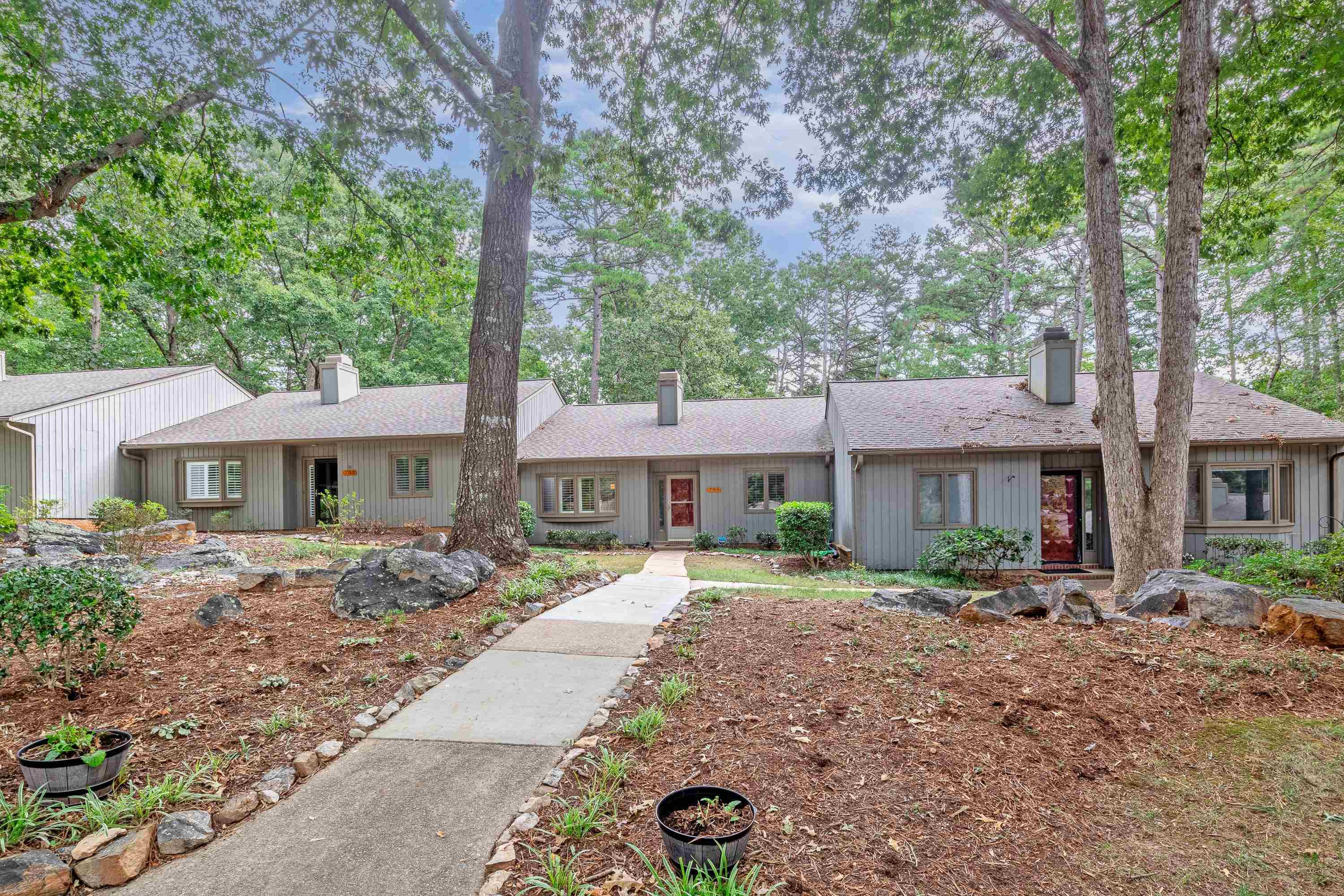 705 Tan Tara Square Raleigh, NC 27615 - Photo 2 of 31 a front view of a house with garden