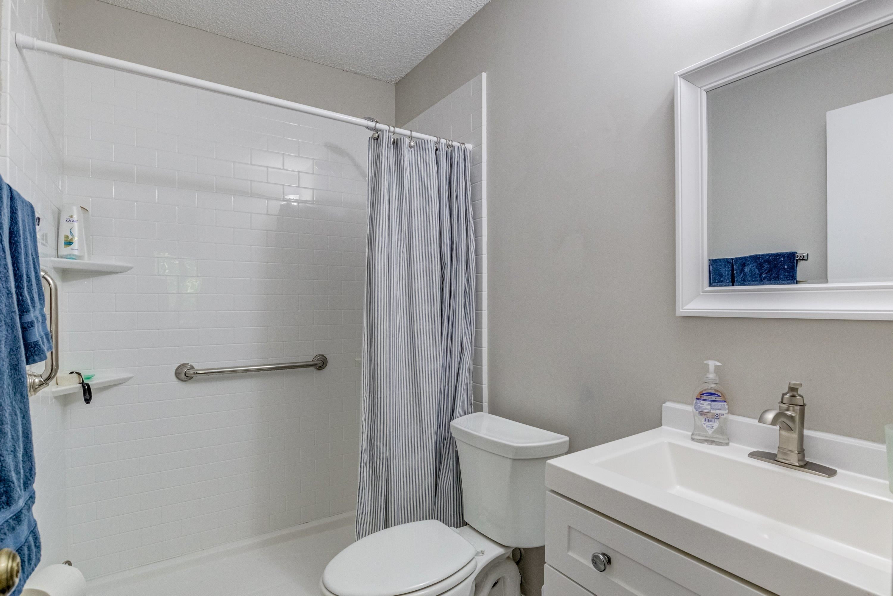 705 Tan Tara Square Raleigh, NC 27615 - Photo 23 of 31 a bathroom with a sink toilet and shower