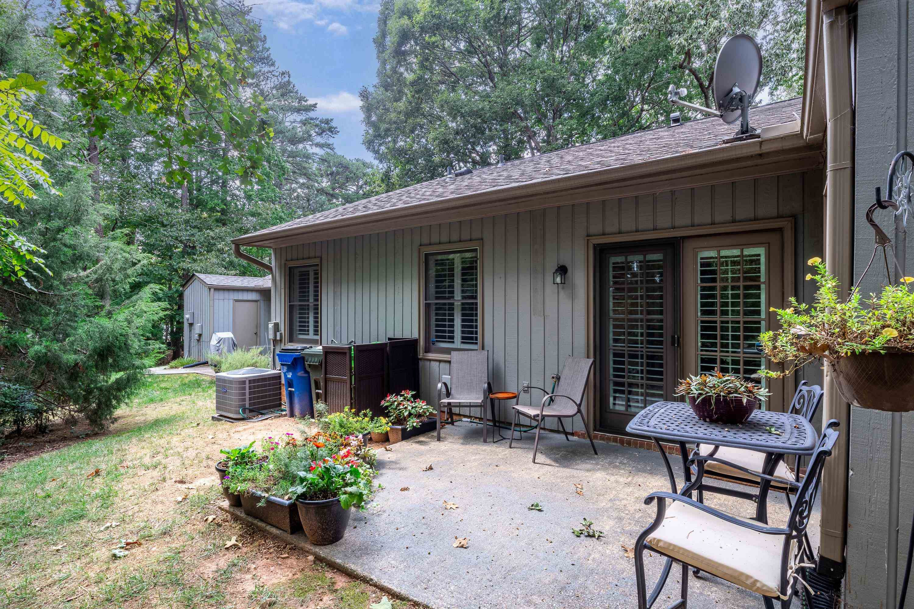 705 Tan Tara Square Raleigh, NC 27615 - Photo 27 of 31 a front view of a house with outdoor seating