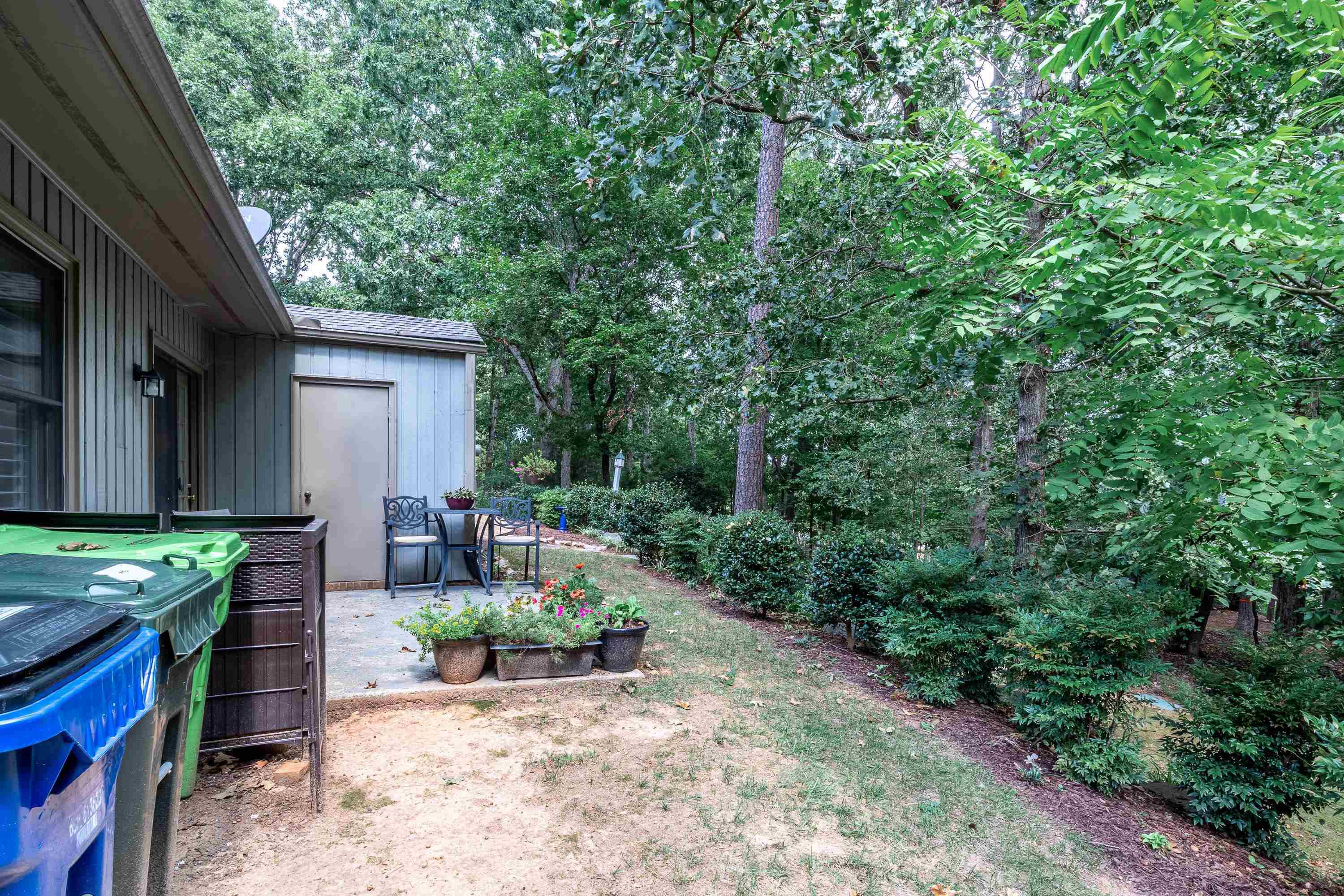 705 Tan Tara Square Raleigh, NC 27615 - Photo 28 of 31 a view of backyard with outdoor seating and green space