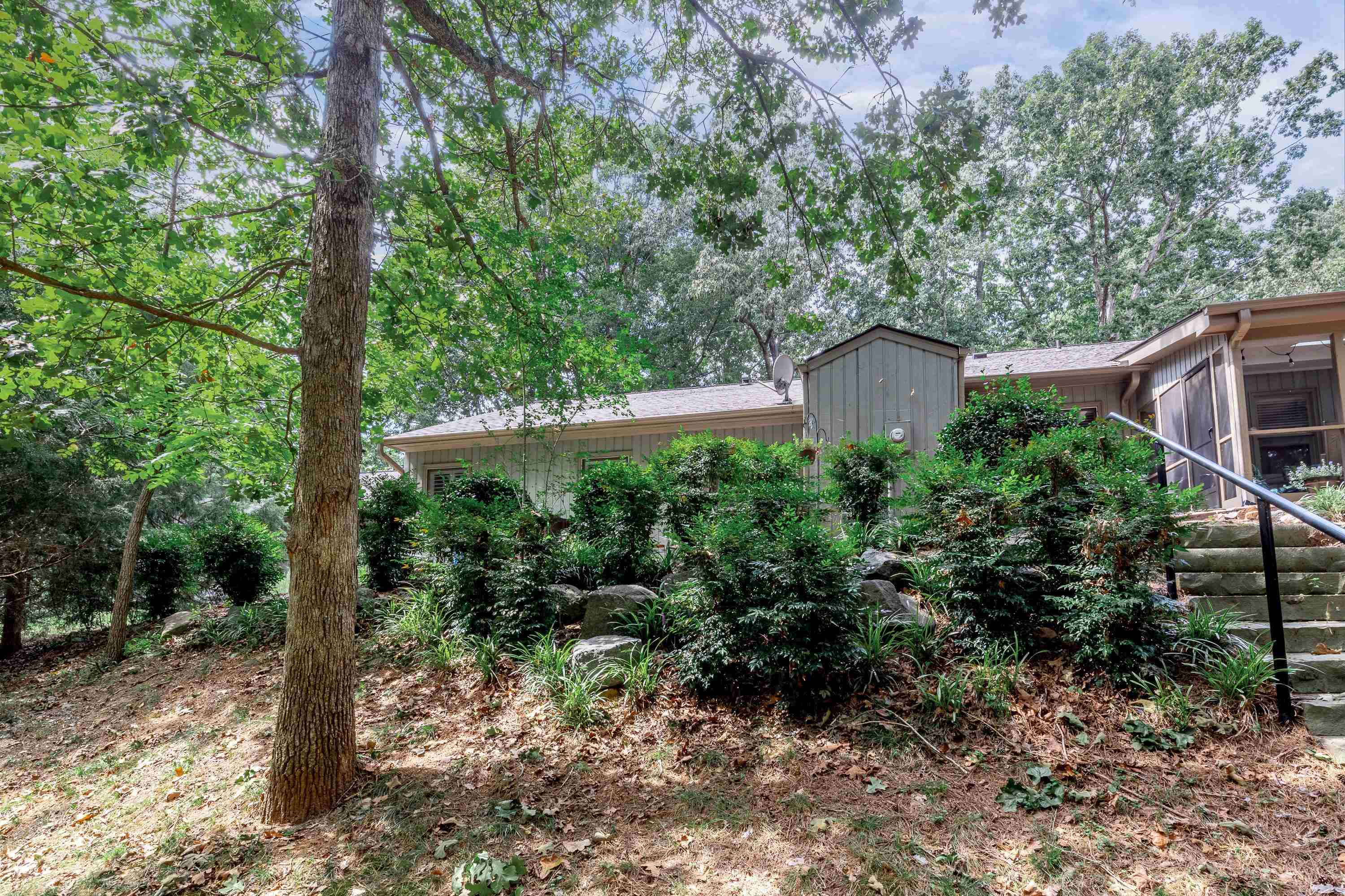 705 Tan Tara Square Raleigh, NC 27615 - Photo 29 of 31 a view of a house with a backyard