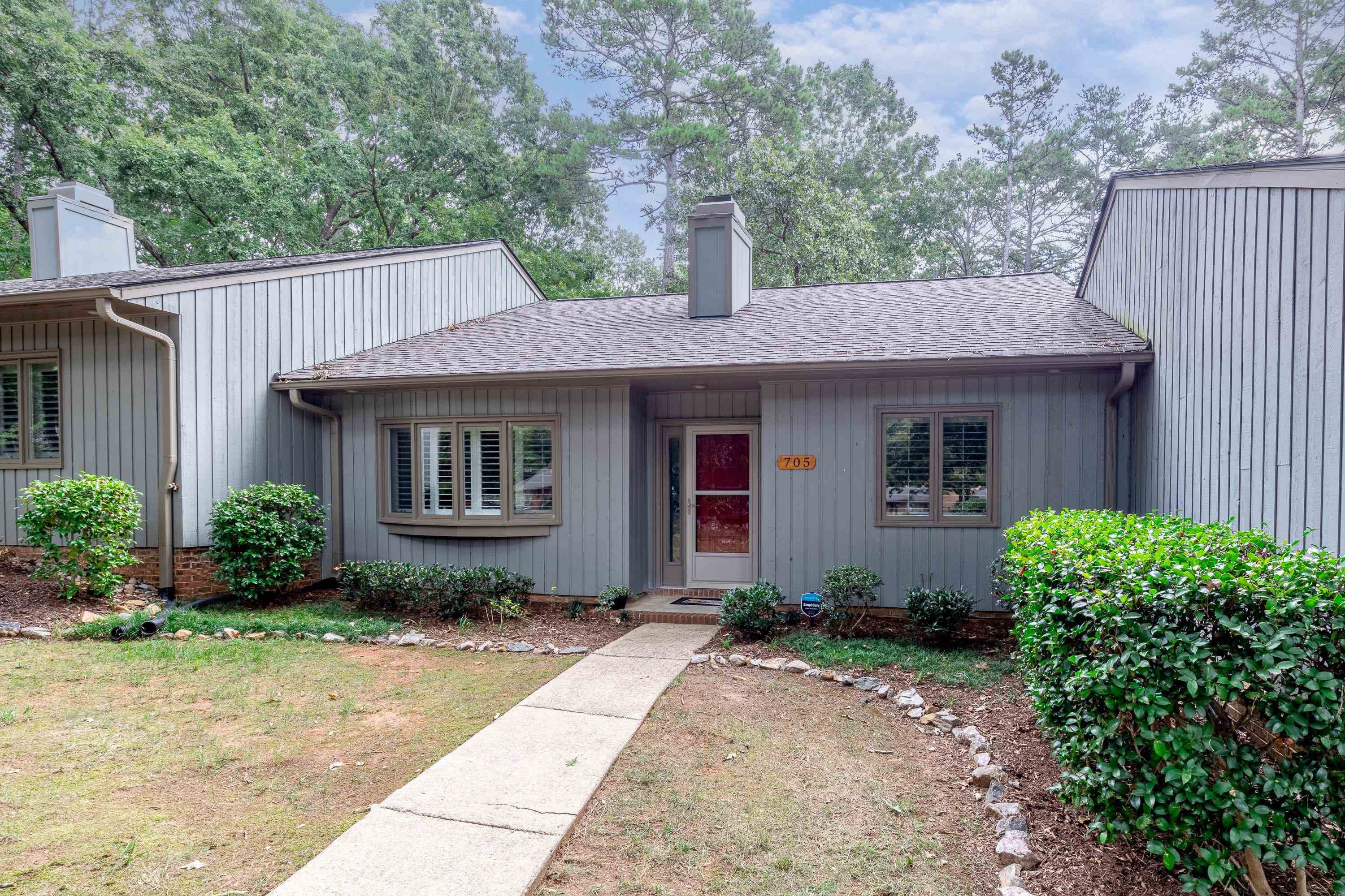 705 Tan Tara Square Raleigh, NC 27615 - Photo 5 of 31 a front view of a house with garden