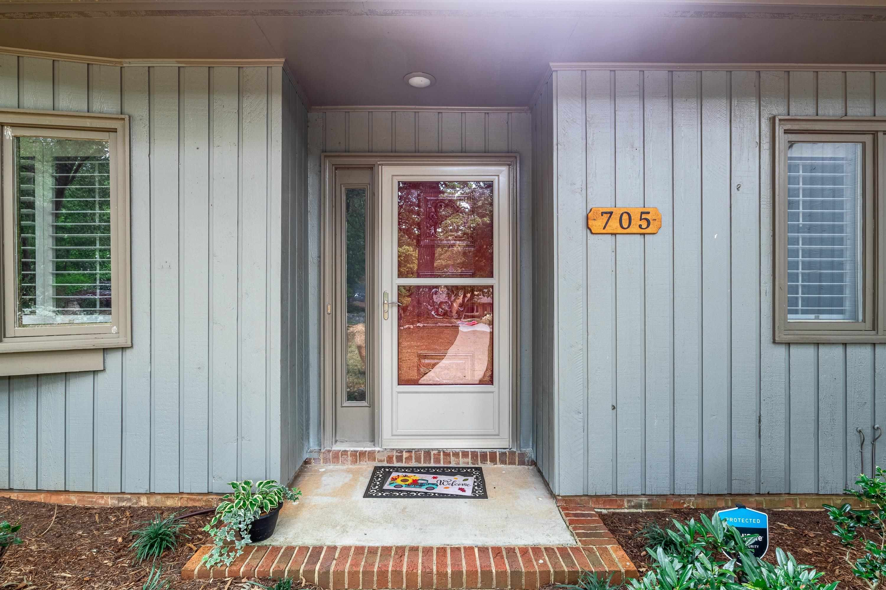 705 Tan Tara Square Raleigh, NC 27615 - Photo 6 of 31 a front view of a house with entryway
