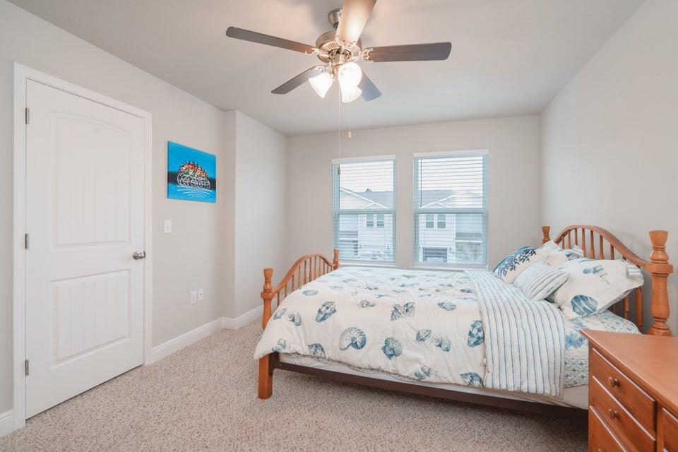 90 Crossing Lane, Unit B Santa Rosa Beach, FL 32459 - Photo 14 of 23 a bedroom with a bed and a window