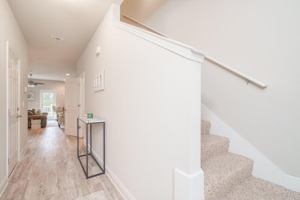 90 Crossing Lane, Unit B Santa Rosa Beach, FL 32459 - Photo 3 of 23 a view of entryway and hall with wooden floor