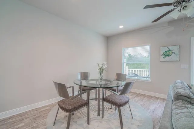 a view of a livingroom with furniture and windows