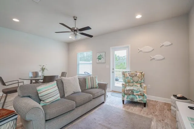 a living room with furniture and a window