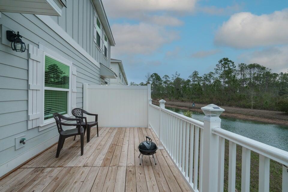 90 Crossing Lane, Unit B Santa Rosa Beach, FL 32459 - Photo 10 of 23 a view of a deck with furniture