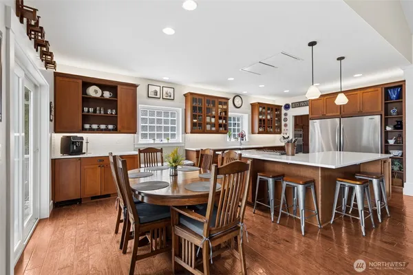 a dining room with furniture and window