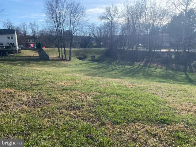 a view of outdoor space with deck and yard