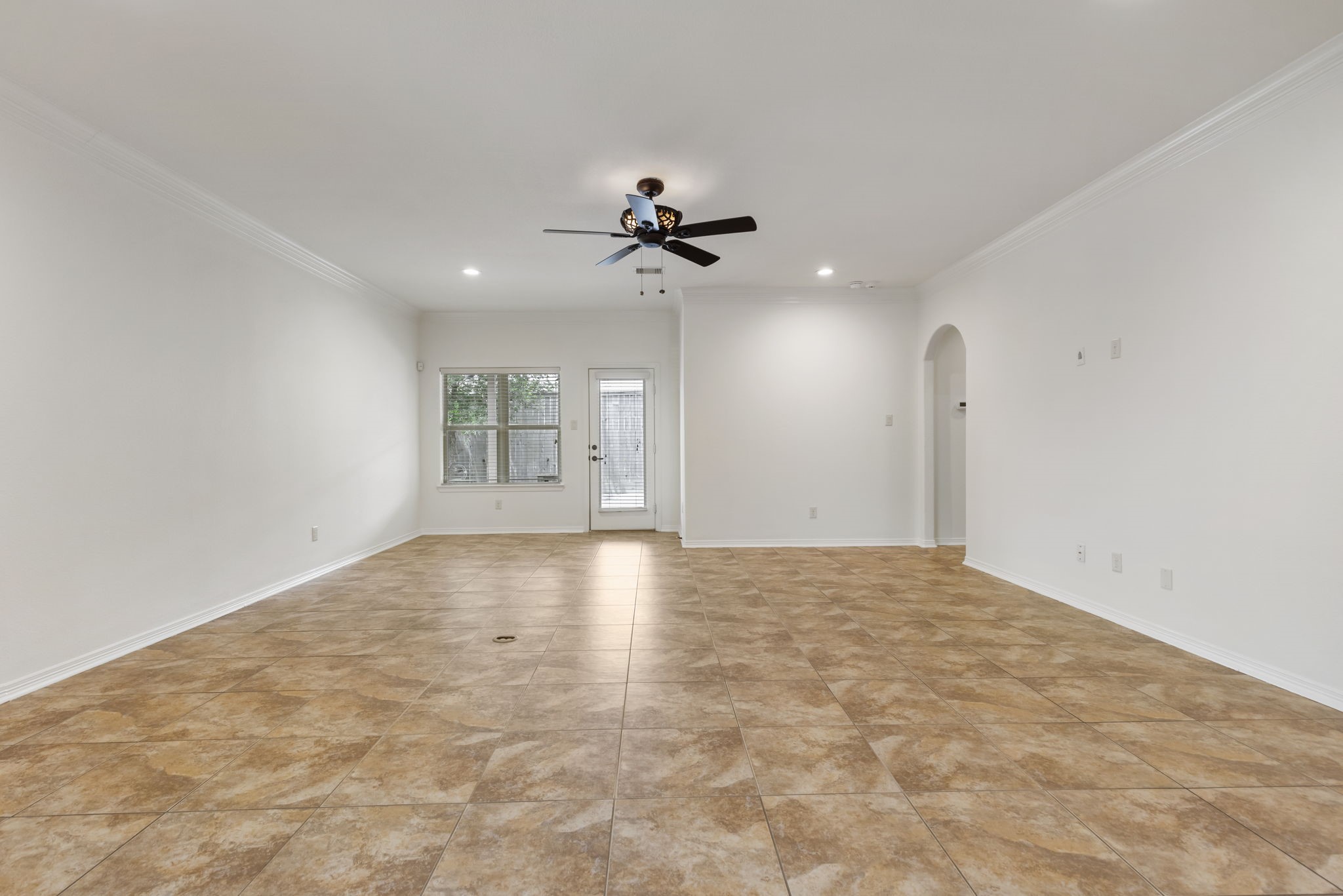 23911 Augusta Falls Lane Spring, TX 77389 - Photo 12 of 40 wooden floor in an empty room with a window