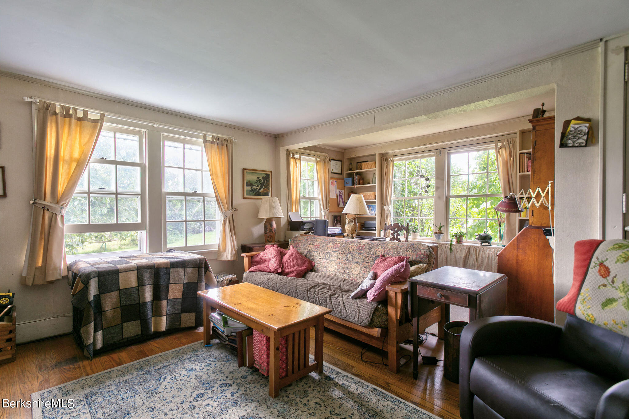 32 Prospect Hill Road Stockbridge, MA 01262 - Photo 19 of 30 a living room with furniture a table and a large window