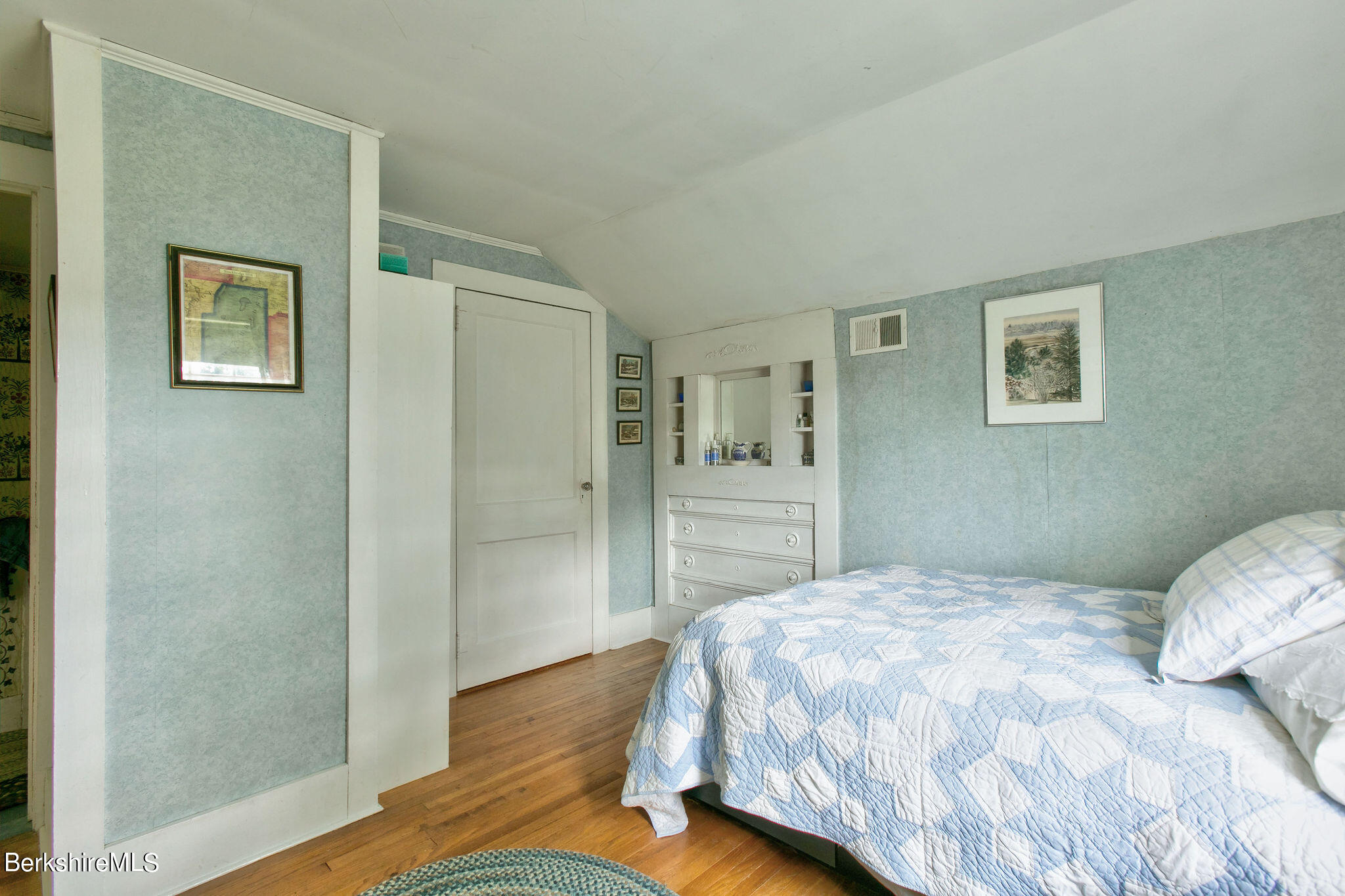 32 Prospect Hill Road Stockbridge, MA 01262 - Photo 25 of 30 a bedroom with a bed and a view of bathroom
