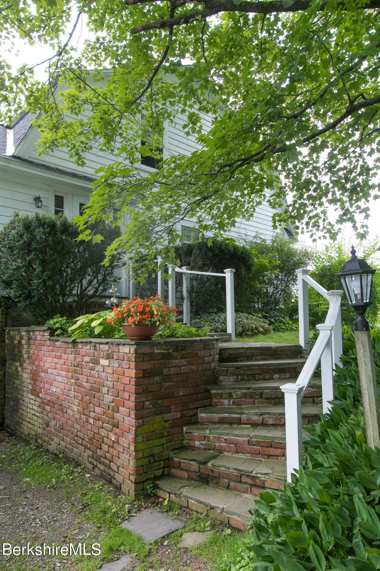 32 Prospect Hill Road Stockbridge, MA 01262 - Photo 28 of 30 a view of a house with a wooden deck