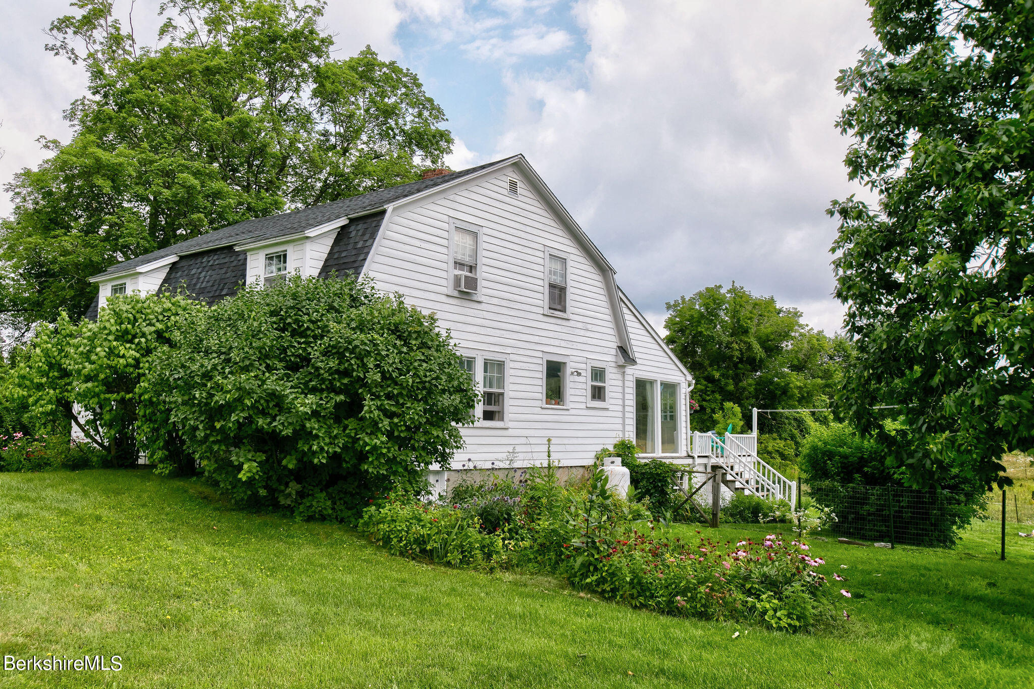 32 Prospect Hill Road Stockbridge, MA 01262 - Photo 4 of 30 a front view of house with yard and green space