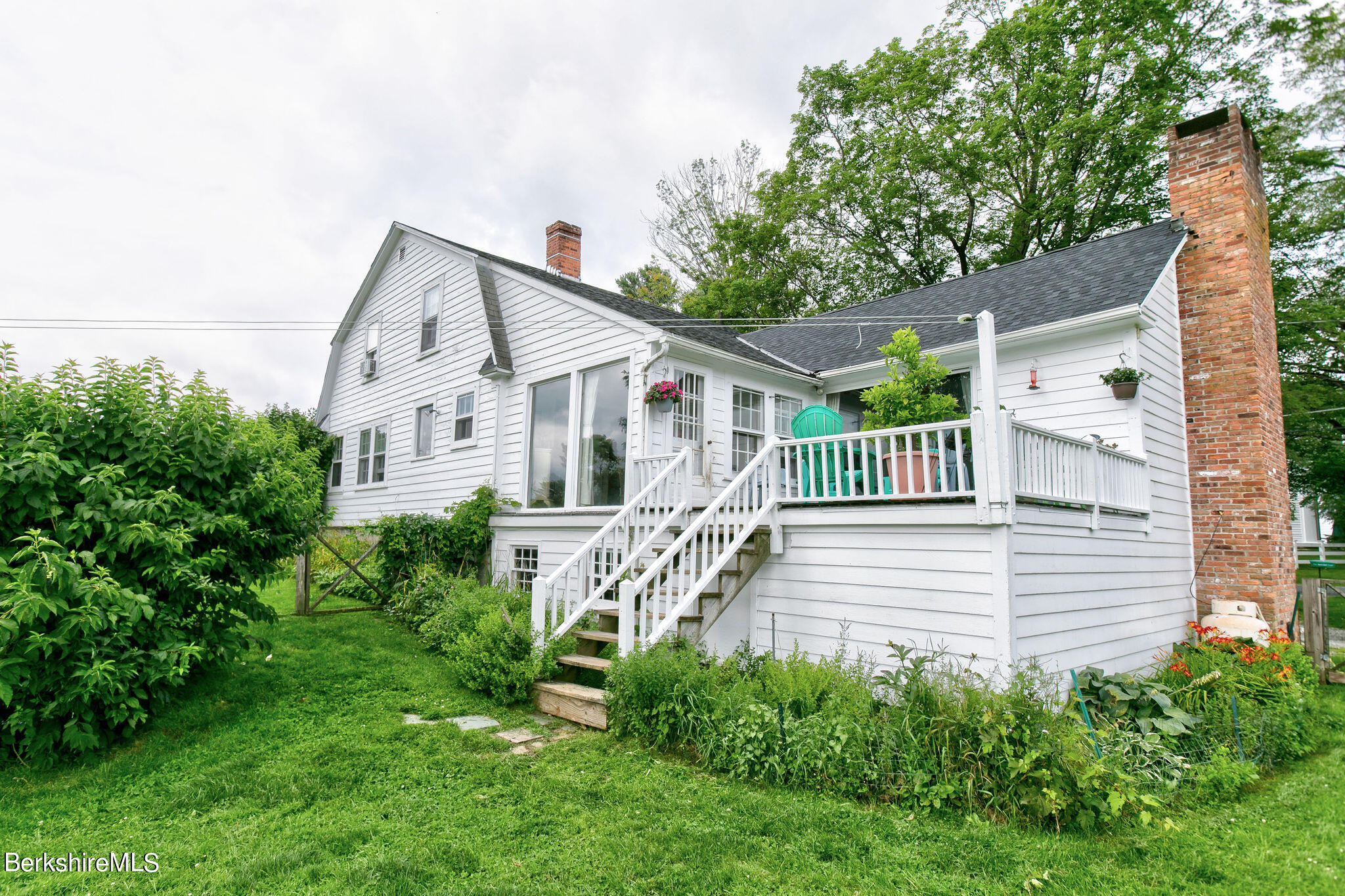 32 Prospect Hill Road Stockbridge, MA 01262 - Photo 7 of 30 a view of a house with a yard