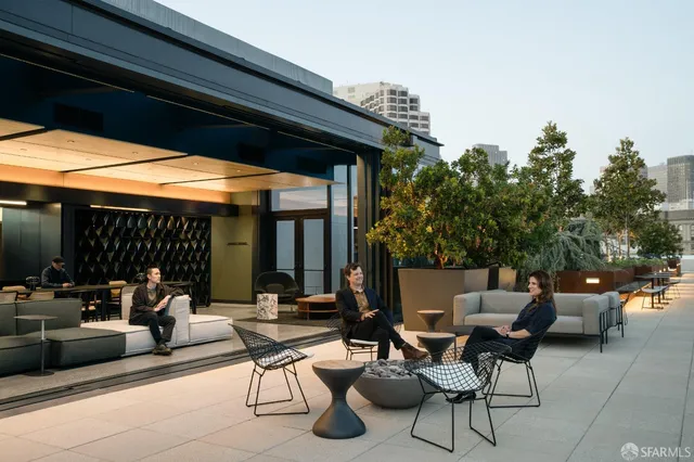 a building outdoor space with patio furniture