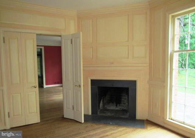 9207 Belmart Road Potomac, MD 20854 - Photo 7 of 13 a view of a livingroom with a fireplace