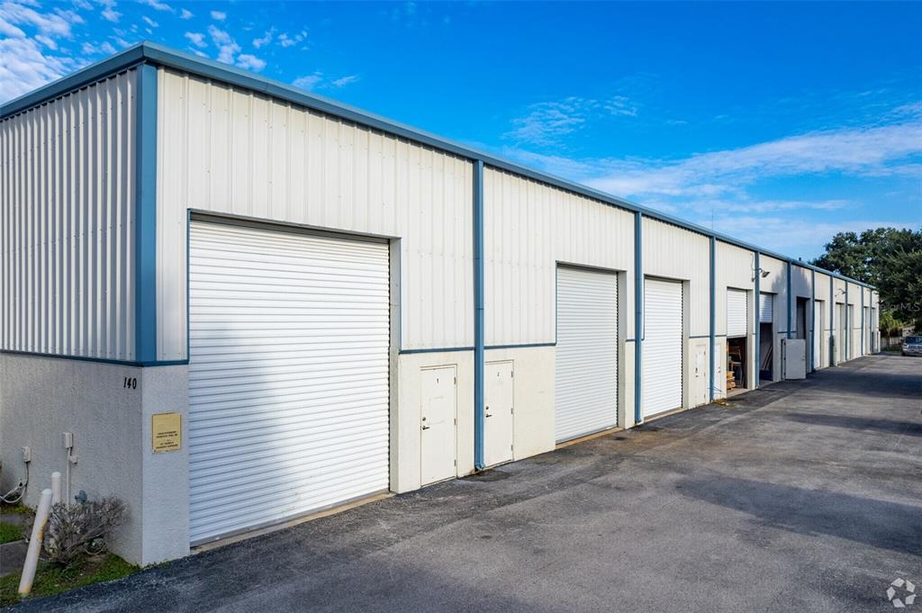 140 Oscar Hill Road Tarpon Springs, FL 34689 - Photo 1 of 3 a view of a house with a balcony