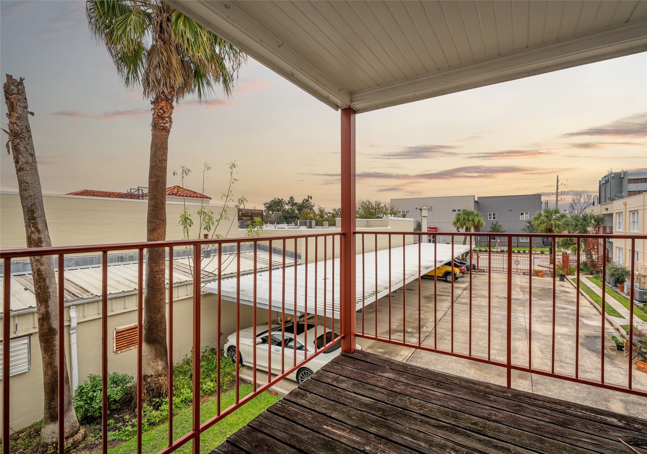 1913 Prospect Street, Unit 5 Houston, TX 77004 - Photo 15 of 17 a view of balcony with wooden floor