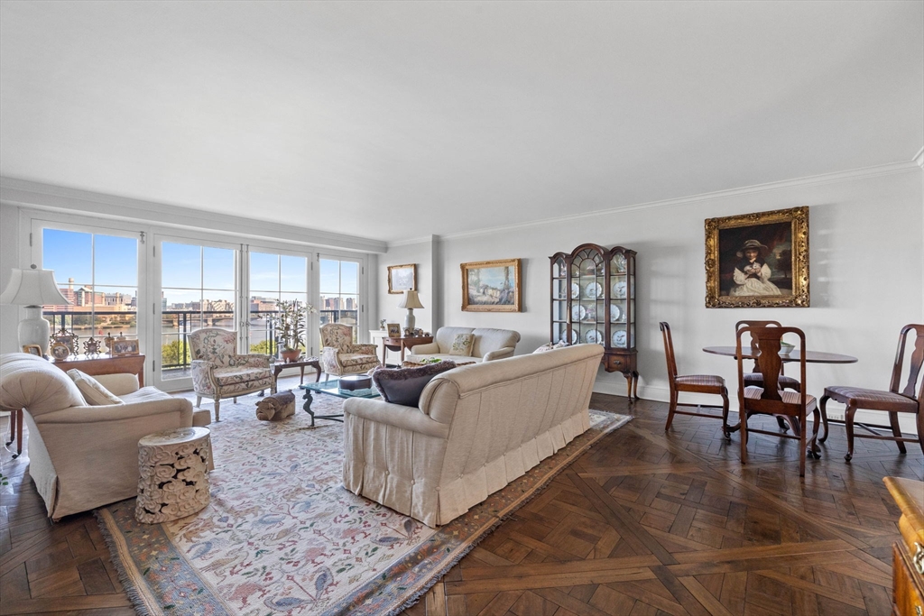 180 Beacon Street, Unit 9G Boston, MA 02116 - Photo 3 of 23 a living room with furniture and a wooden floor