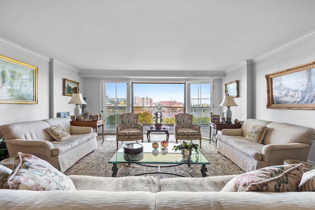 180 Beacon Street, Unit 9G Boston, MA 02116 - Photo 4 of 23 a living room with furniture and wooden floor