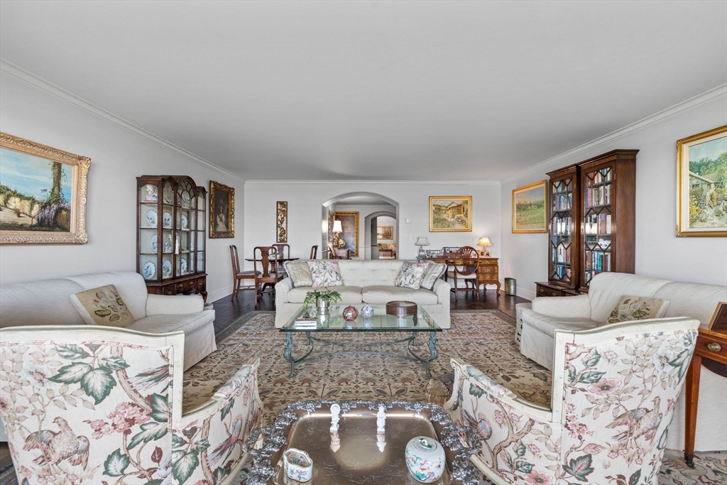 180 Beacon Street, Unit 9G Boston, MA 02116 - Photo 6 of 23 a living room with furniture and wooden floor